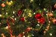 © KOTO - Close up ornaments and string lights on Christmas tree