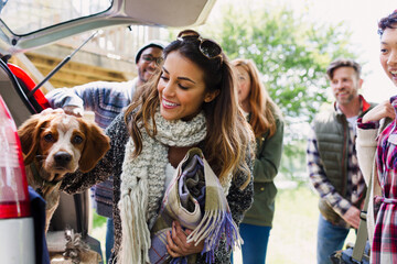 Canvas Print - Friends with dog at back of car