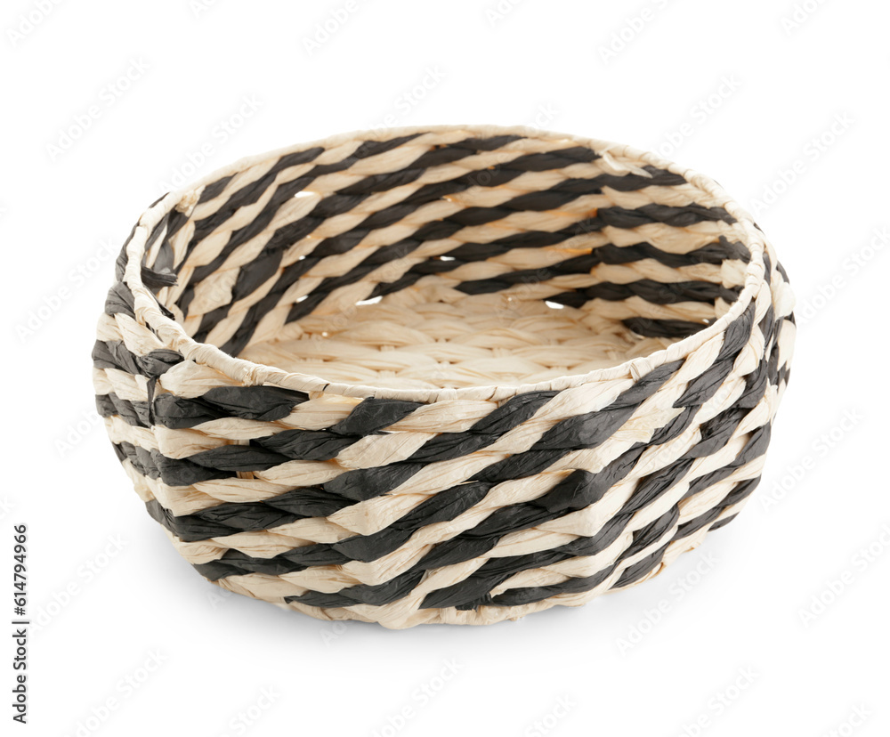 Round wicker basket on white background