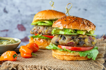 Plantain and black bean burger in brioche bun