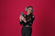 © Alexandre - garota mulher feliz com celular nas mãos, com roupa cheia de corações , promoção dia dos namorados ou dia das mães, dia da mulher