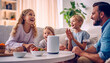 © annebel146 - Smart AI speaker concept Happy Family talk to voice assistant at home and feel happy having fun. technology and internet concept Happy father, mother and children