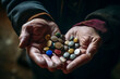 Medicine pills in old hands.