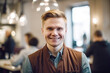 © Jasmina - Portrait of a happy and smiling waiter, or small business owner in the coffee shop.