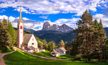 Amazing Alpine scenery.  Beautiful Dolomites mountains. view of San Giacomo church near Ortisei village. Val Gardena, South Tyrol, Italy