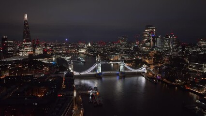 Wall Mural - Aerial night view of the Tower Bridge in London. Beautiful illuminated panorama of London Tower Bridge.