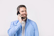 © be free - communication call of happy man. having communication call. man has communication call on phone isolated on studio background. man with communication call in studio.