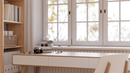Minimal Scandinavian home workspace with copy space on a wooden table