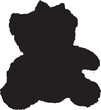 a silhouette of a small teddy doll