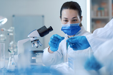 Wall Mural - confident scientist working in the science lab