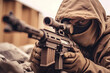 Backside soldier holding a gun, close-up sniper