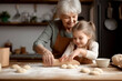 © Рика Тс - An active age grandmother engages her little granddaughter in rolling yeast dough and sculpting pastry dough. A caring elderly grandmother shares home baking skills with her granddaughter. Generat AI