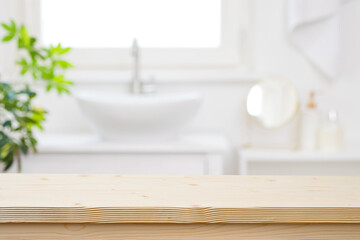 Wall Mural - blurred bathroom hand washing corner with wooden table in front