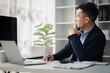 © kamiphotos - Man in the office, he is young businessman, modern business management, start-up company run by young people, modern entrepreneur with new ideas. to be a business leader. Startup company concept.
