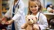 Cute kid girl playing doctor in doctors scrub suit with plush toy at hospital.