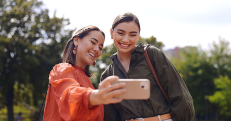 Poster - friends and selfie in city with smile, peace sign and funny face with kiss, tongue and outdoor. Girl, women and street in metro for social media, photography or profile picture in park