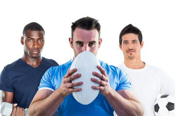 Poster - Digital png photo of diverse men with dumbbell, football and rugby ball on transparent background