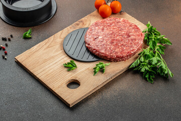 Wall Mural - Raw steak cutlets from minced beef meat on a wooden board, Long banner format. top view