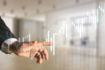 Poster - Man hand presses on abstract virtual financial graph on blurred office background, financial and trading concept. Multiexposure