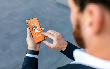 Poster - Businessman holding smartphone, using chatbot in business operations