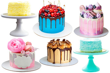 Wall Mural - Set of bright colorful cakes isolated on white background, png. Cakes with fondant ruffles, fresh berries, chocolate, caramel