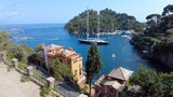 Fototapeta  - Europe, Italy, Portofino - The bay of Portofino in Tigullio Mediterranean sea national natural reserve  park near Genoa - the harbour with boats and yachts - amazing nature with purple bougamvillea