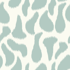 Seamless ikat pattern with abstract green elements.