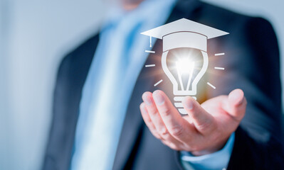 Fototapete - Concept of Online education. man use Online education training and e-learning webinar on internet for personal development and professional qualifications. Digital courses to develop new skills..