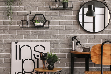 Canvas Print - Modern hairdresser workplace near grey brick wall in salon