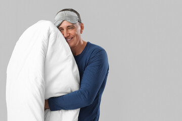 Sticker - Mature man with soft blanket on grey background