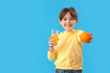 Sticker - Little boy with orange and glass of juice on blue background