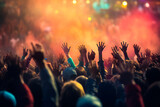 Fototapeta Dmuchawce - Crowd raising hands up during concert or festival
