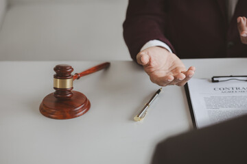 Attorneys advising in cases where a client has been defrauded by a defendant who is a business partner forming a joint company, advising on litigation and gathering evidence. Fraud case concept.