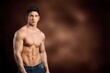 © BillionPhotos.com - Muscular sporty young guy posing on background.