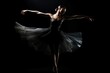 A dramatic and moody low key image of a ballerina in motion. Generative AI