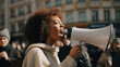 young beautiful African American woman in a jacket on the background of the rally through a megaphone. Generative AI