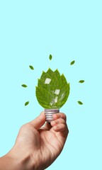 Wall Mural - eco-friendly concept, lightbulb with green fresh leaves
