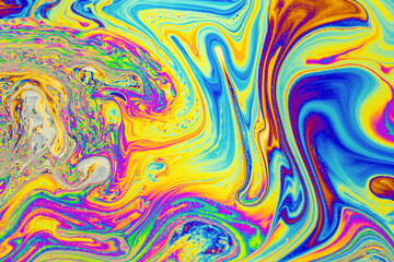 Wall Mural - psychedelic multicolored background abstract. rainbow colors. patterns background. photo macro shot 