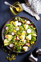 Canvas Print - Spring green salad with egg, radish and onion