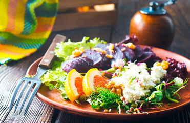 Canvas Print - Beet with goat cheese and nuts. Top view