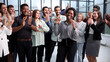 © Katsiaryna - Business people clapping their hands after a seminar