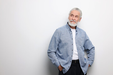 Portrait of handsome senior man on white background. Space for text