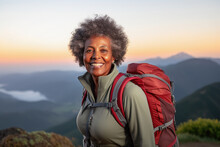 Active Retired Black Woman Hiking Outdoors In Mountains In Fall