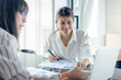 © littlepigpower - Business wome meeting at office about business planning and Brainstorming Strategies of Colleagues