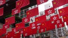 Hong Kong And China Flag At Hong Kong Lei Tung Street.