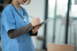© Thitisak - Female nurse doctor Working in a hospital or clinic
