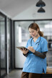 © Thitisak - Female nurse doctor Working in a hospital or clinic