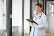 © Thitisak - Female nurse doctor Working in a hospital or clinic