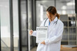 © Thitisak - Female nurse doctor Working in a hospital or clinic