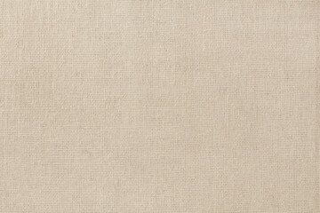 Brown cotton fabric cloth texture for background, natural textile pattern.